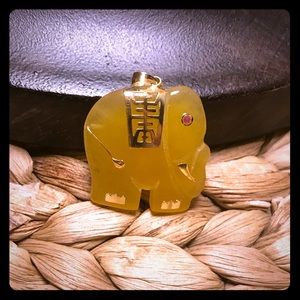 14 K And Yellow Jade Elephant Pendant.